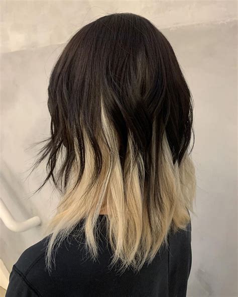 black and blonde hair underneath